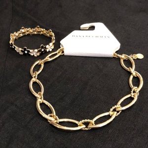 Gold tone necklace and daisy bracelet